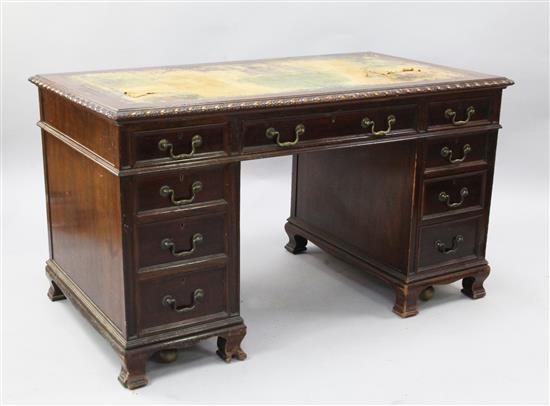 An Edwardian mahogany pedestal desk, W.4ft 6in. D.2ft 6in. H.2ft 6in.